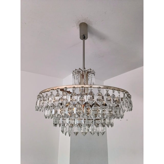 Stuning, four- tier exquisite mid-century modern crystal glass chandelier by Balawits& Söhne manufactured in the 1960s....