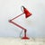 Red Anglepoise model 1227 desk lamp designed by George Carwardine, manufactured by Herbert Terry & Sons between 1938-1968....