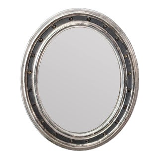 Irish Ebonized and Silver Parcel Gilt Oval Wall Mirror (H 23 1/4 X W 19 1/4) For Sale