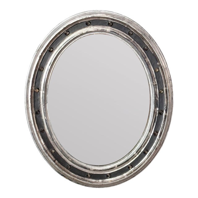 Irish Ebonized and Silver Parcel Gilt Oval Wall Mirror (H 23 1/4 X W 19 1/4) For Sale