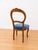 An elegant set of five 1950s chairs. The frame is made entirely of walnut, finely carved with floral motifs on the top of...