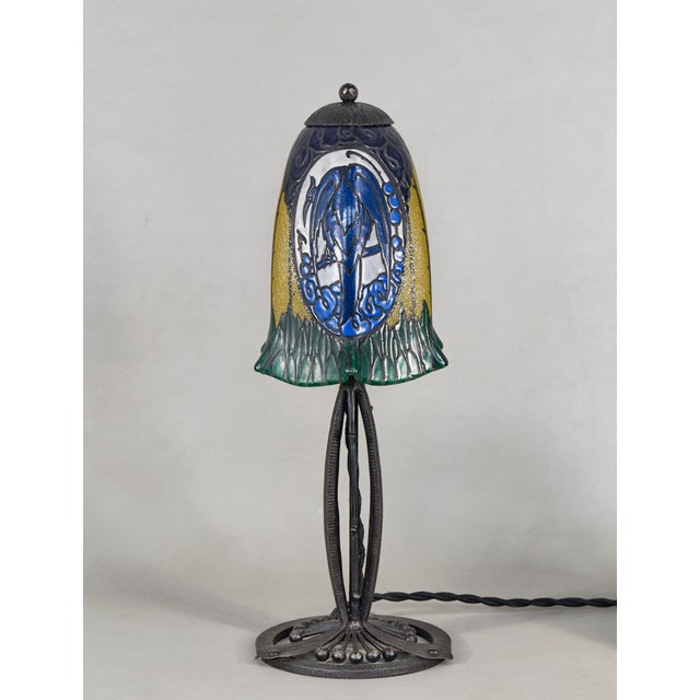Etablissements Leune - Auguste Heiligenstein A wonderful and very rare French art deco lamp made around 1925. A wrought...