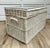This vintage white wicker storage chest is one of those wonderfully versatile pieces that works almost anywhere. Topped...