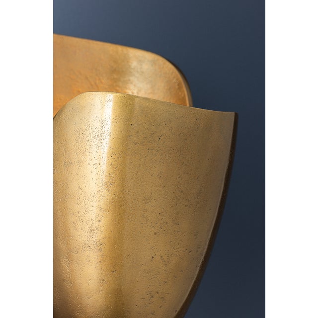 Bideford is a petite and expressive sconce with a botanical motif. Its cast metal shade has a subtle texture beneath the...