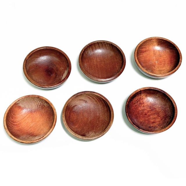 A fabulous set of six vintage Mid-Century wooden bowls crafted in the clean, organic style that defined Danish Modern...