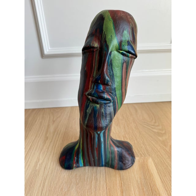 Striking studio-made clay bust featuring an elongated modernist face with closed, meditative eyes and a sculptural...