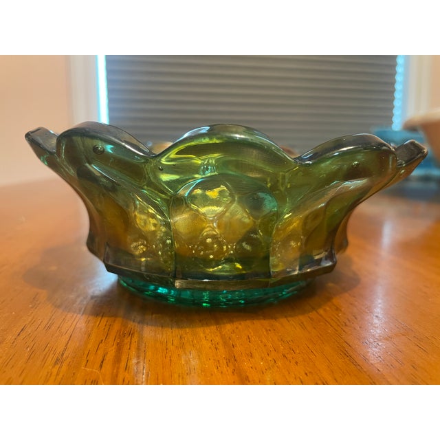 This decorative glass bowl exemplifies the Mid-Century Modern aesthetic that flourished from the 1940's through the...