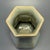 Classic Chinese official‑style celadon hexagonal porcelain vase, crafted with angular faceted body and flared neck. Soft...