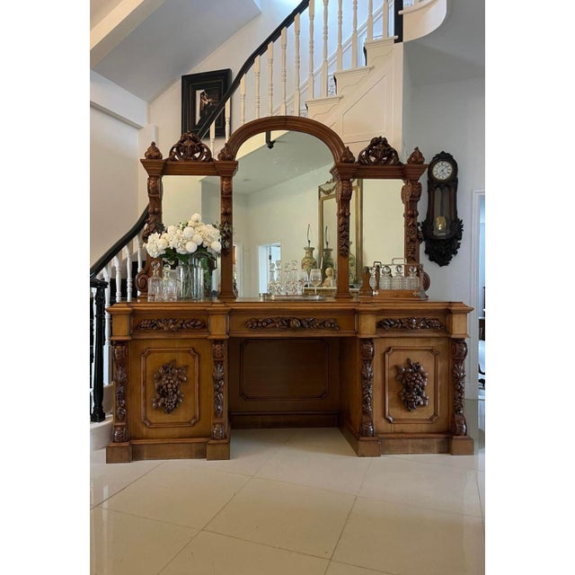 Magnificent Victorian antique carved oak mirror back sideboard having an impressive large mirror back with beautifully...