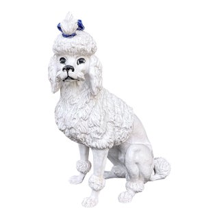 Italian Faience Poodle Figure, White Glaze With Blue Bow, Mid-20th Century, 21 3/4 In. Tall For Sale