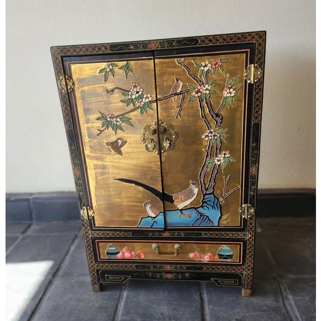 Midcentury Chinese two-door cabinet with hardstone possibly jade and mother-of-pearl inlay. Elegant relief garden scene...