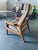 Danish Mid-Century Teak High Back Lounge Chair by Gustav Thams. The designer chair is designed as a high-backed chair and...