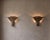 This captivating pair of wall lamps stands out for its distinctly sculptural and geometric design, a clear expression of...