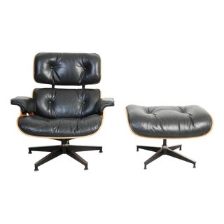 Set of Lounge Chair and Ottoman in Black Leather by Charles and Ray Eames, 1990s For Sale
