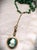 Vintage gold paisley-etched pocket watch locket with green and cream cameo profile of a Victorian woman in rolled-edged...
