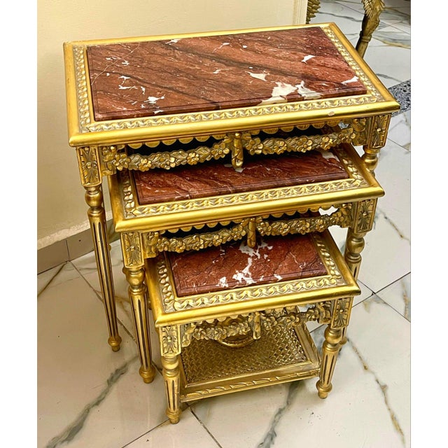 This elegant set of three French style nesting tables combines timeless design with practical functionality. Each table...