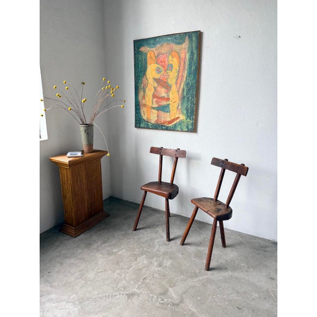 Antique pair of tripod chairs, of savoyard origin. we love their folk art style; their handcrafted character gives them a...