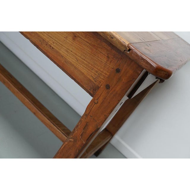 This elegant table was made in Southern France in the mid 19th century. The table was made in solid elm with beautiful...