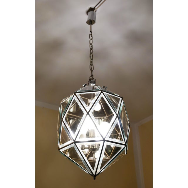 Ceiling lamp with cut crystal diffusers and mirrored finish on each side. Nickel-plated brass spacers. Chain and support...