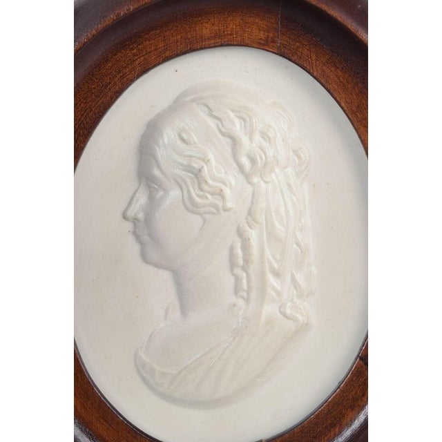 Meissen Biscuit plaque, c. 1970s. Oval relief plaque in white biscuit porcelain with a classical female profile portrait,...