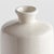 In the perfect shade of warmWhite and finished in a crackle glaze, this bottle vase adds a subtle sophistication to any...