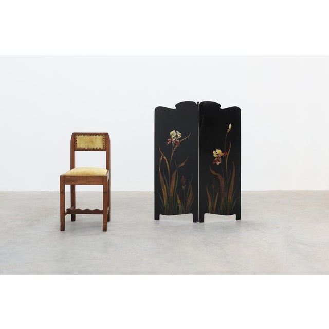 An elegant French Art Nouveau folding screen dating from the early twentieth century, crafted as a two-panel room divider...