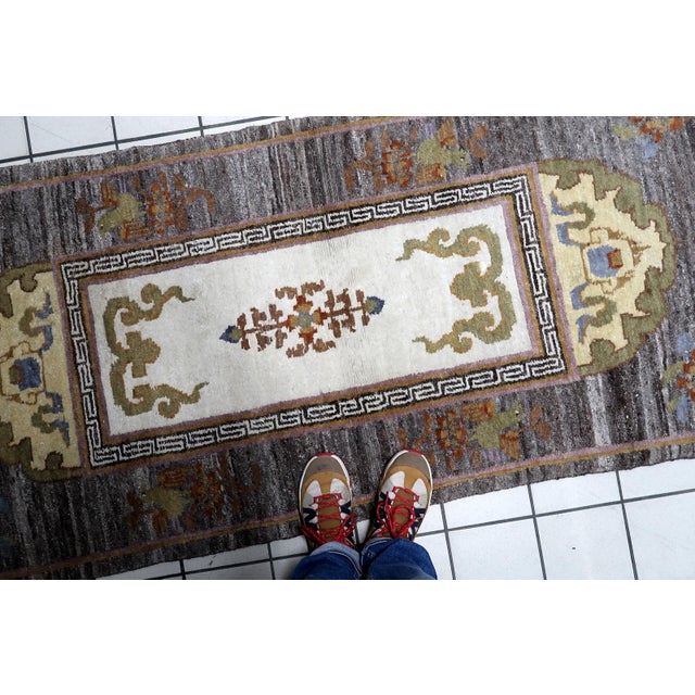 An exceptional example of mid-century Tibetan weaving, this vintage Khaden (traditional sitting rug) masterfully blends...