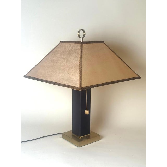 Exclusive table lamp of exceptional quality, featuring a beautifully hand-crafted solid brass base with a remarkable...