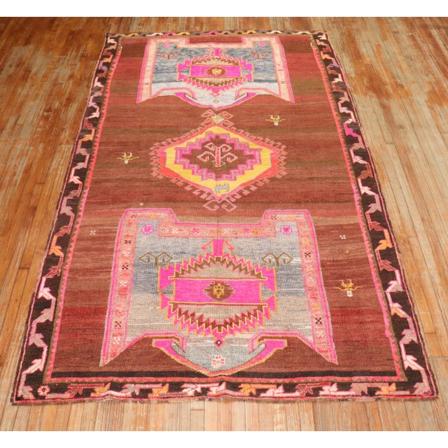 A Mid 20th century Turkish Kars Gallery size Rug in bright jazzy colors. Look at the 3 people floating around too!!...