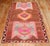 A Mid 20th century Turkish Kars Gallery size Rug in bright jazzy colors. Look at the 3 people floating around too!!...