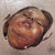 When I Play Along by Benjamin Garcia | Oil on Board Portrait of a woman's face with expressive features For Sale