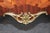 Magnificent, richly detailed, and unmistakably French, this antique Louis XV Style bronze ormolu mounted commode embodies...