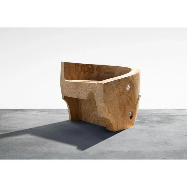 Minos armchair by woody fidler materials: olive wood dimensions: w 73.5 x d 60 x h 61 cm seat w 53.5 cm seat d 53 cm woody...