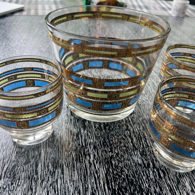 Fabulous vintage mid century modern Culver 'Empress' footed whiskey rocks glasses and matching ice bucket! The ice bucket...