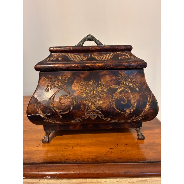 A stunning vintage bombe-shaped decorative wood storage box by luxury-maker Maitland-Smith. This substantial piece...