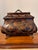 A stunning vintage bombe-shaped decorative wood storage box by luxury-maker Maitland-Smith. This substantial piece...