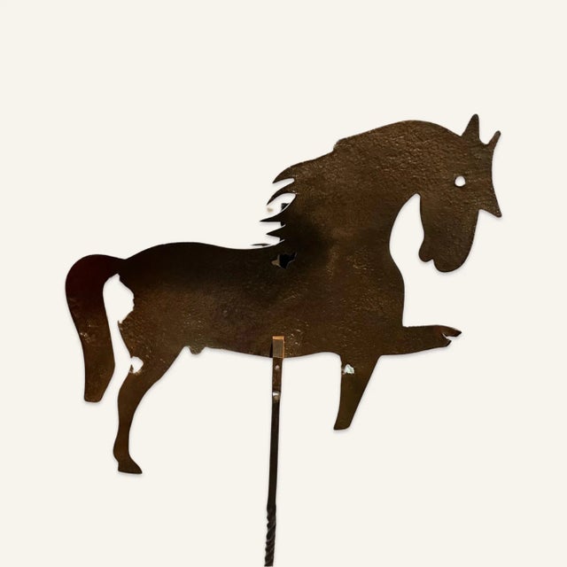 Early 19th century American weathervane made of hammered iron. This weathervane bears all the marks of several hundred...