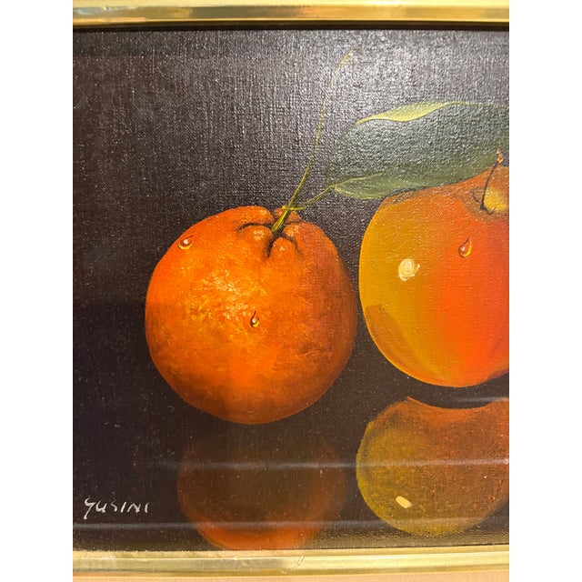Original Antonio Gusini (b. 1901) painting. Known for his dramatic chiaroscuro style, Gusini renders two vibrant oranges...
