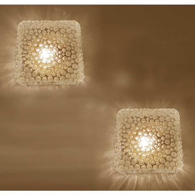 Pair Vintage mid century sonces / ceiling fixtures featuring a bubble glass shade set into a bronze enameled base, heavy...
