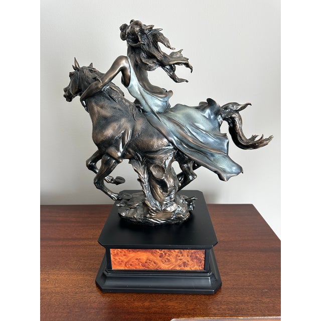 Crafted by the renowned Giuseppe Armani, the "Liberty" Free Spirit Lady on a Horse sculpture captures the essence of...