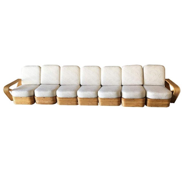 This beautifully restored coastal Art Deco six-strand square pretzel style, Seven-seat sectional sofa. This sofa features...