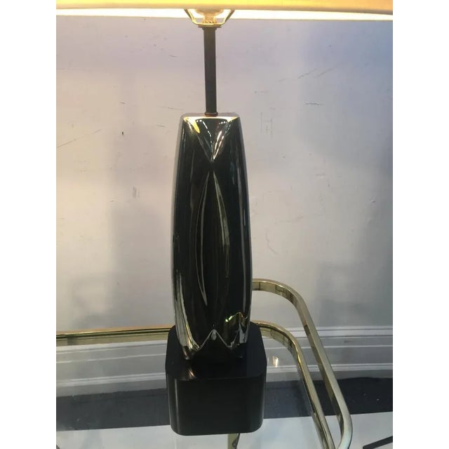 Striking Pair of Chrome Sculptural Abstract Metal Lamps Mounted On Ebonized Wood Bases.Designed in The 1970's By The...