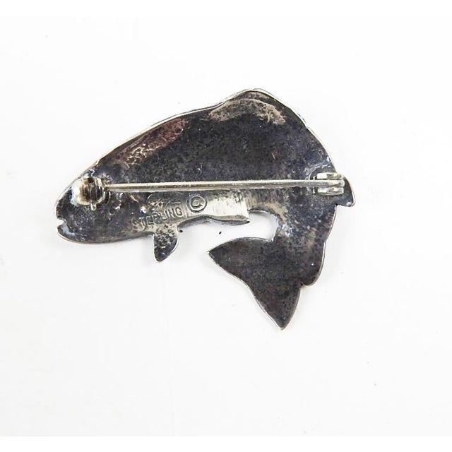 Small vintage Kit Carson sterling silver engraved trout pin. Stamped on back, overall patina.