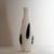 Elegant white and black blown glass vase.