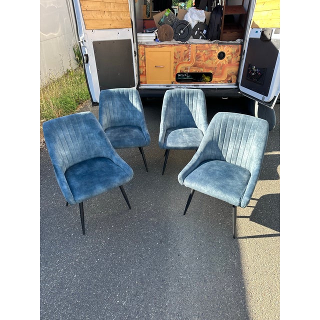 The most comfortable dining chairs I have ever sat in, these beautiful soft denim colored chairs have been the centerpiece...