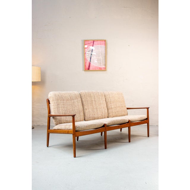 A three-seater teak sofa, designed by svend age eriksen and manufactured by glostrup – a true classic of the 1960s. The...