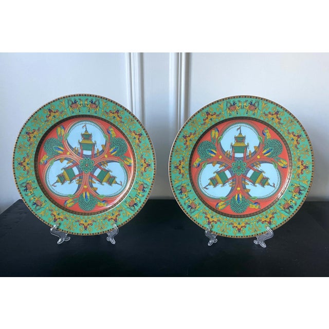Designed by Gianni Versace for Rosenthal Studio Line, these "Le Voyage De Marco Polo" service platters or charger plates...