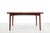 Vintage teak dining table that can be extended on two sides. The extra leaves are beautifully integrated into the design,...
