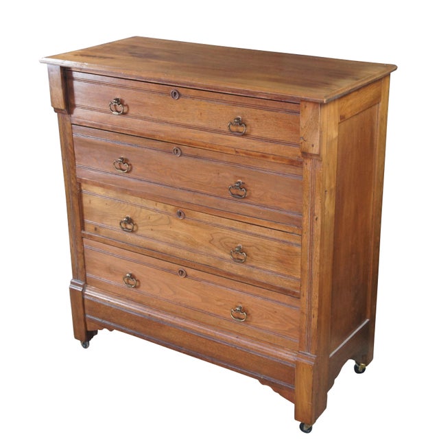 Late 19th Century American Victorian Chest of drawers. Features four Knapp jointed drawers with brass drawer pulls and...
