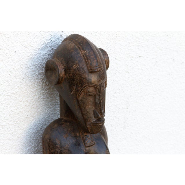 This 37-inch figure is a powerful example of the celebrated sculptural traditions of the Mumuye people from the Middle...